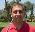 Kevin Moses on Golf course with Club